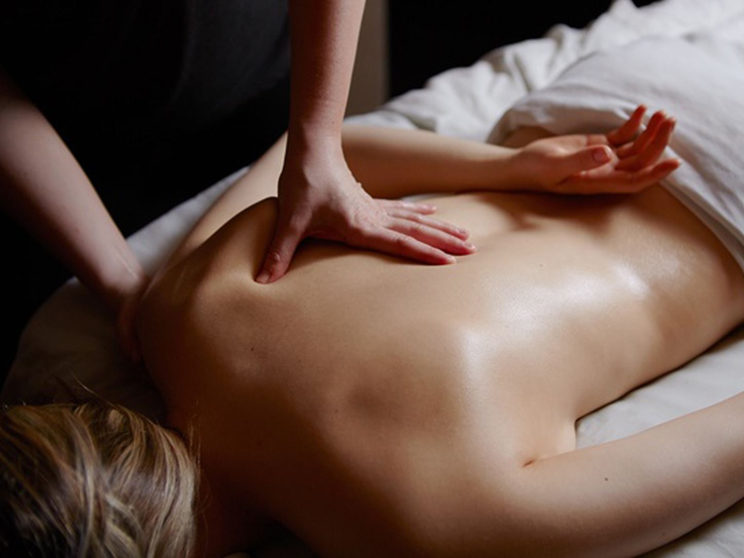 Clean fresh linens during a back massage at Golden SPA in Lake Forest CA